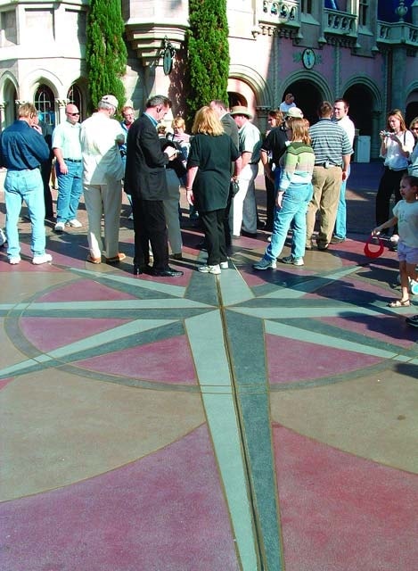 Tour of concrete participants learn that the compass rose outside of Cinderella Castle in the Magic Kingdom was made possible with a lot of rebar and color hardener.