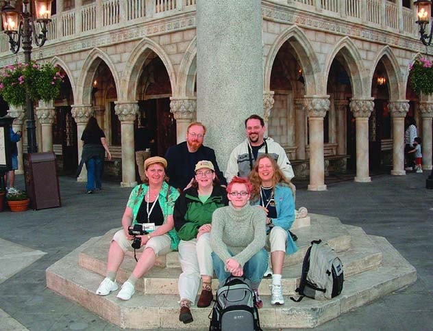The hardworking crew from Concrete Decor magazine poses for posterity at a plaza in Epcot before dinner.