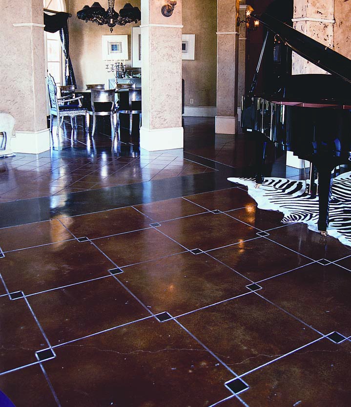 Geometric squared are placed in this concrete floor and acid stained to accent the overlapped corners of the squares.