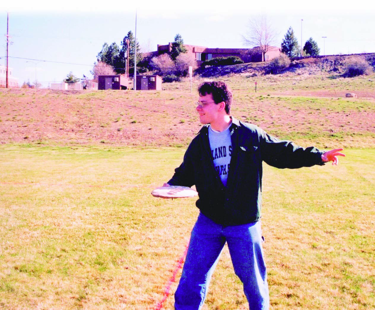 A student takes a concrete frisbee for a test run.