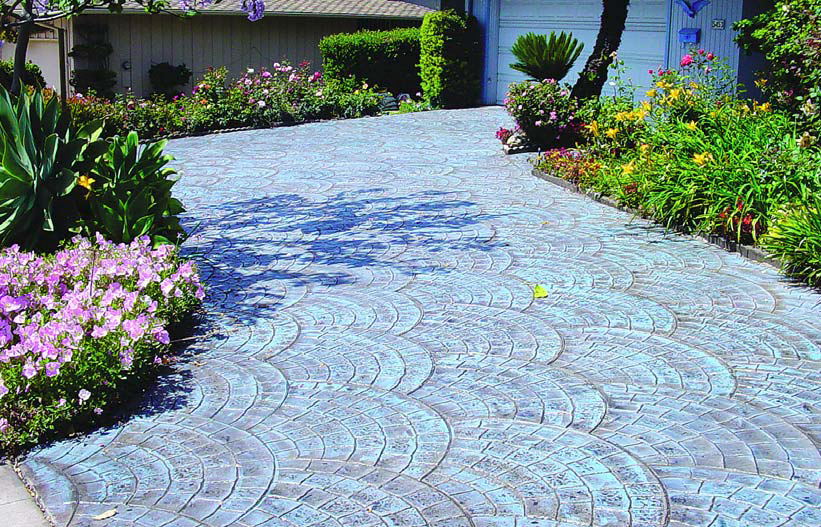 Driveway stamped and colored with Super Krete products in a radial fan pattern.
