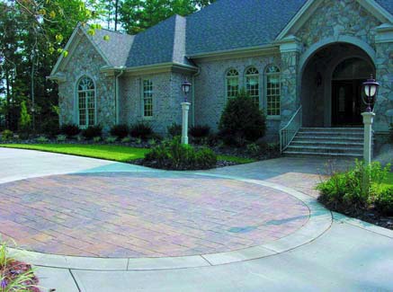 QC Construction products were used to create this expansive stamped concrete driveway.