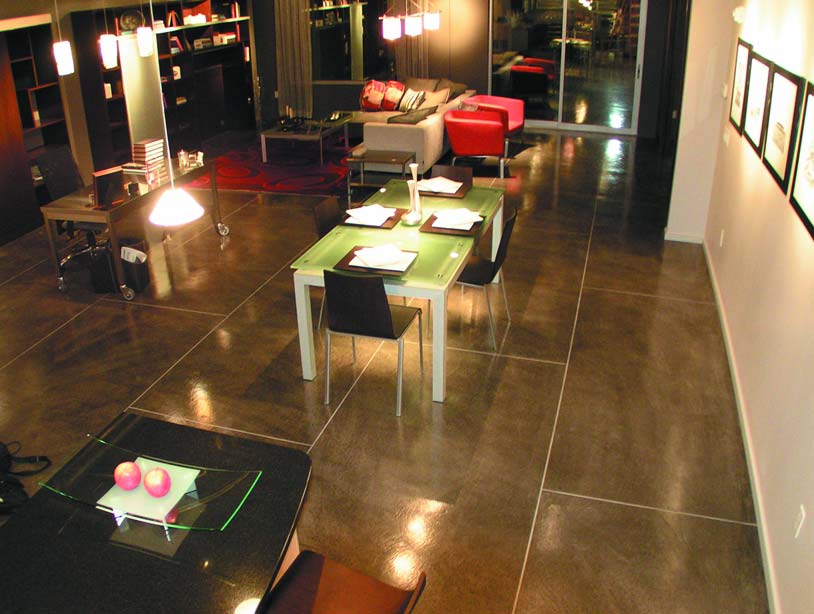 Mikhal Zambon floor design concrete stained restaurant floor in a extra large rectangle pattern.