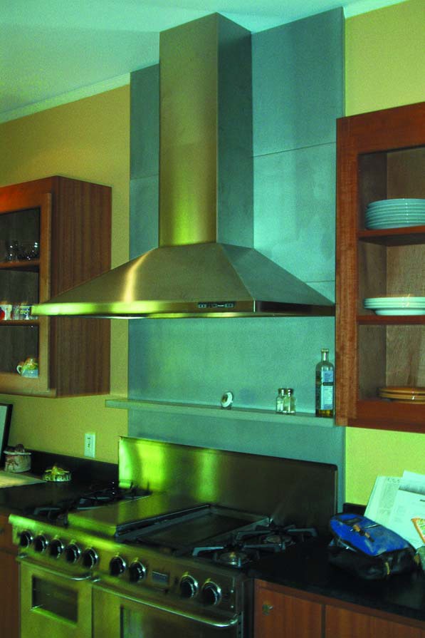 Metakaolin - Kitchen countertop and splash behind oven hood. Photograph courtesy of Concrete Encounters