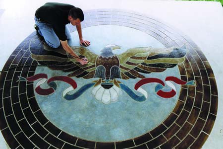 Engrave-a-crete used to create an eagle flying in a brick circle.