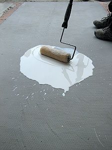 Rolling a concrete sealer with a paint roller - For new floors, surface cleaning and preparation should be pretty straightforward. But if you have a previously finished surface to which you are applying sealer, the porosity of the surface is an important factor as well, Adams says. For example, if the old floor has been sealed with a penetrating sealer in the past, you may have a problem applying a film-forming sealer.
