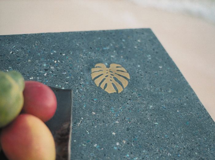 Lokahi Stone - Teal concrete countertop with inset brass leaf.