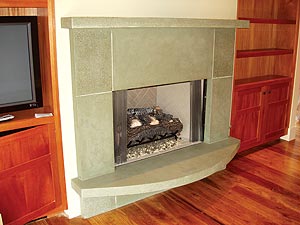 Sage green precast concrete craftsman style fireplace surround