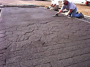 Pervious Concrete being stamped. Pores in pervious concrete can become ?lled with silt and other particulate matter. This can affect appearance, particularly if the ?ll is deeper in some portions of the slab than in others.