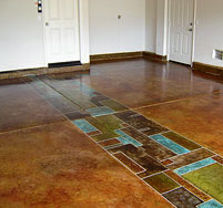 Acid stained and acrylic stained concrete floor in blues, greens and browns.