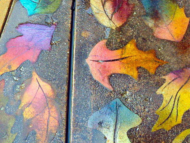 Multi-toned acrylic stained concrete leaves
