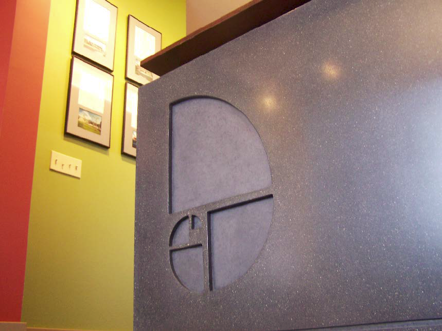 Concrete imprinted logo on side of counter