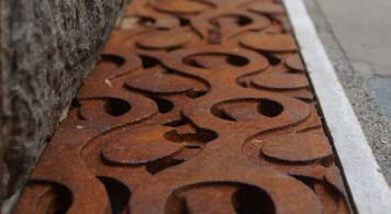 Close up of grate cover made of cast-iron