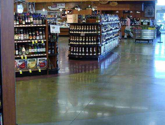Polished concrete floor in a retail store near the wine and beer selections