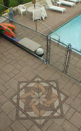 A geometic pattern at the entrance of this pool fence.