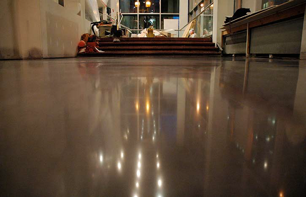 The final floor finish at the Roche-Bobois store in Montreal. It features a semigloss sheen on a restored and colored concrete slab.