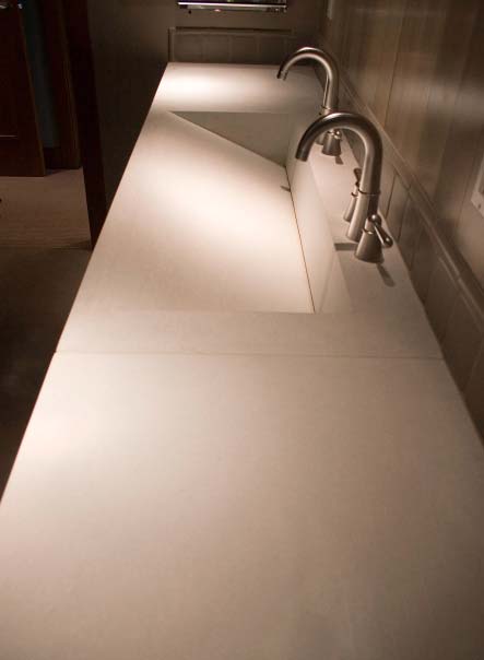 Design element of a slanted sink in white.