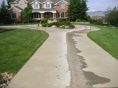This driveway in the Denver area is an example of concrete damage from freeze-thaw cycles. A Surfacing Technology crew made repairs (left) using a high-strength mix containing polymers.