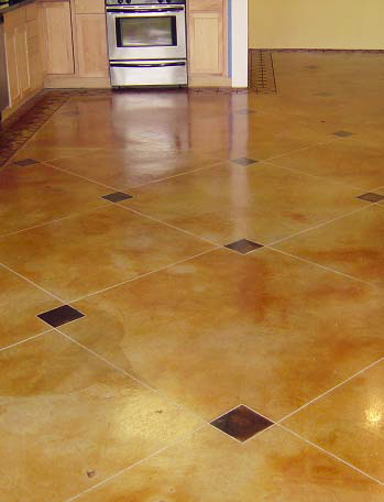 Acid stained concrete floor with darker smaller squares scattered throughout.