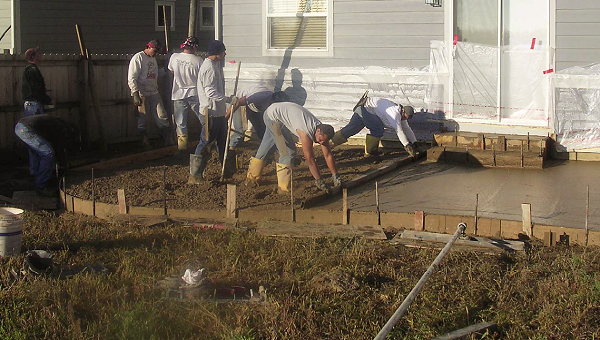 Placing concrete with a crew during cold weather takes time and precision.