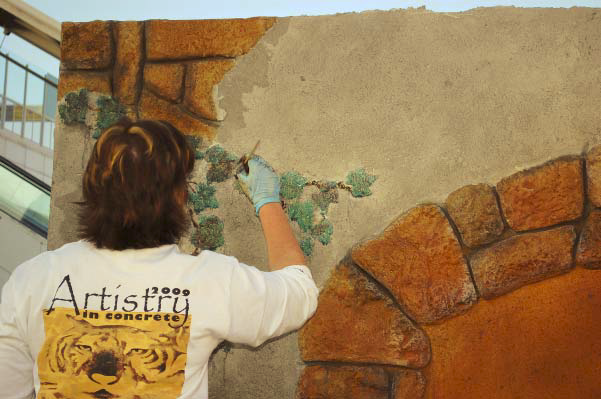 Cindee Lundin works on her Artistry in Decorative Concrete project.