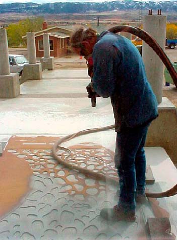 Sandblasting in metal concrete stencil in Casper, Wyo.