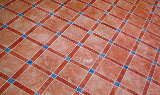 For your next resurfacing project, try this crisp, clean tile design on a concrete surface by SuperStone.