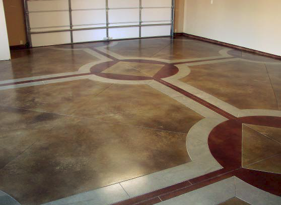 A garage floor with browns, reds and whites bring a lifeless room a new look.