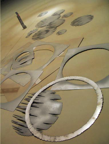 A beach theme was illustrated through plasma-cut steel templates of stylized pier images