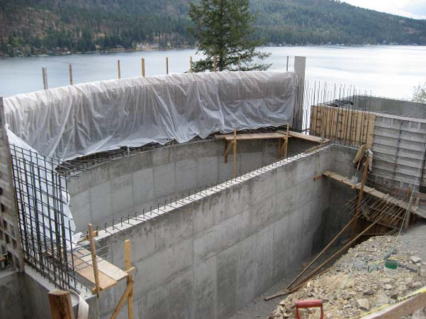 The shotcrete is usually applied in two layers, with waterproofing tackled between the first and the second layer. After the final coat, there is an optional crystalline waterproofing that is actually mixed into the concrete, he says