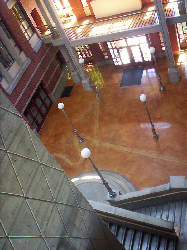 Deschutes Hall at the University of Oregon in Eugene. Note layers of detail in the natural-gray concrete elements  tie holes, board-formed butt joints, rustication strips  all supported by the warm, iron-salt-stained concrete slab. The variegated patina of the slab also includes layers of detail.