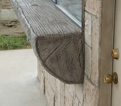 Concrete quarter round log used as window ledge