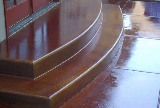 Beautiful stained concrete steps in a rustic brown shade.