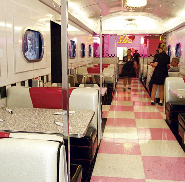 The look of a terrazzo floor at this retro diner was achieved with an epoxy floor coating.