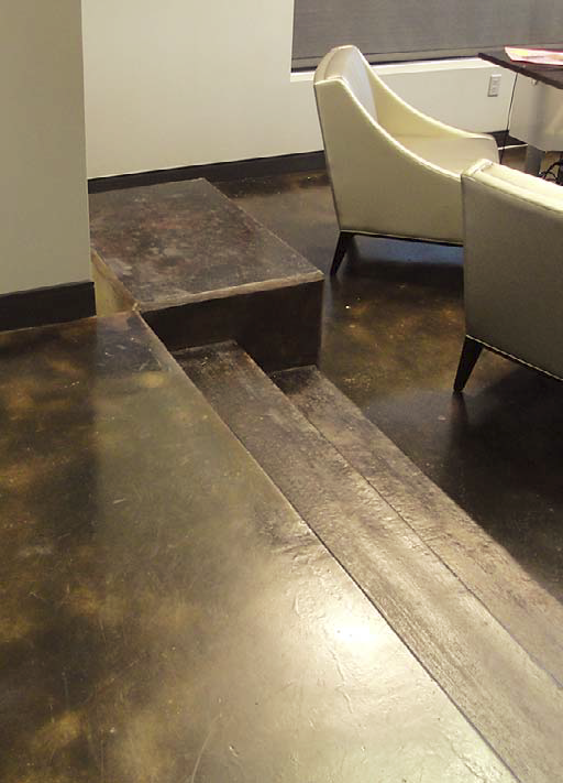 Concrete steps that have been stained with a brown stain.