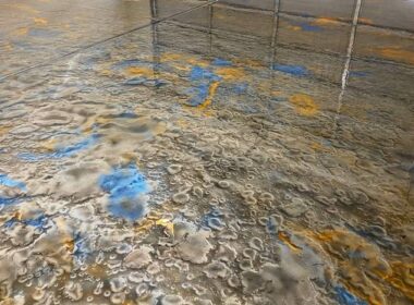A blue and gray mix of metallic epoxy with orange accents.