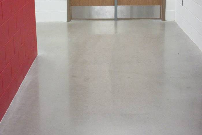 Hybrid polished concrete in a hallway