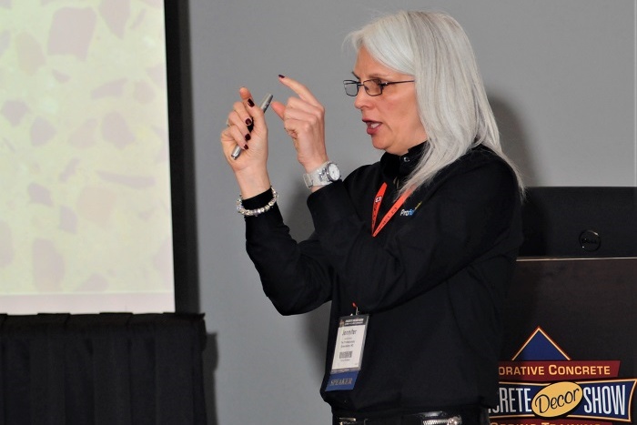 Jennifer Faller teaching a course at the Concrete Decor Show about understanding chemical treatments for polished concrete