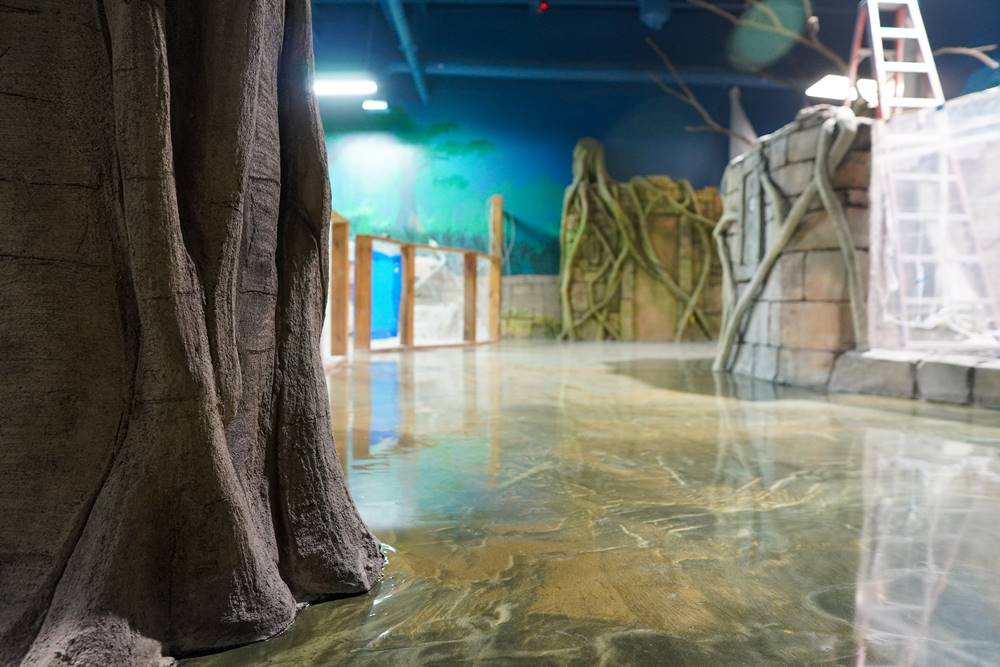 A life-like tree trunk made of wood at Seaquest