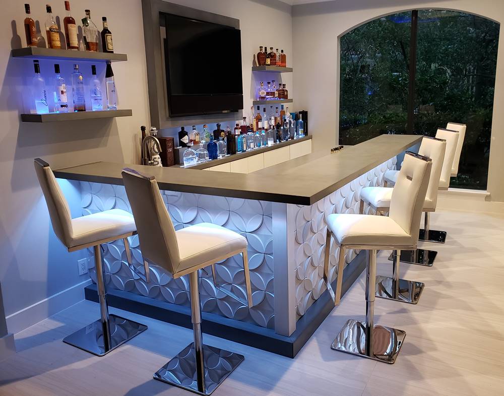 residential bar featuring concrete countertops