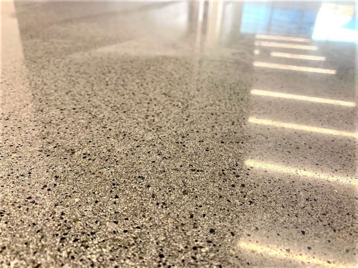 a close up of the salt-and-pepper polished topping overlay by CTS installed in a US Bank in Ohio