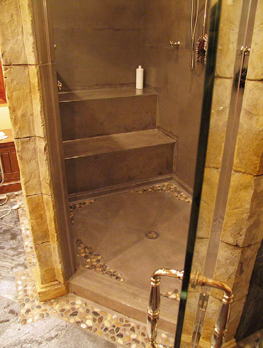 A residential steam shower that utilizes GFRC wall and ceiling panels and molded seating to keep moisture from escaping.