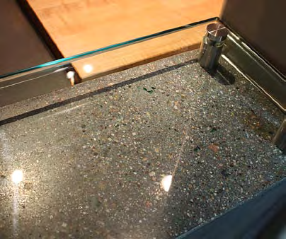 A look at the glass aggregate on the countertop in this home.