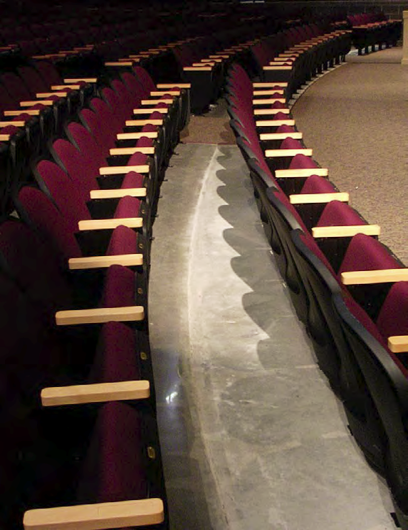 This auditorium at Millstone Township Middle School, N.J., features a combination of carpet and exposed concrete. Joe Smith, Natural Stone Care, Media, Penn., hardened and densified the floor and polished to an 800-grit resin finish.