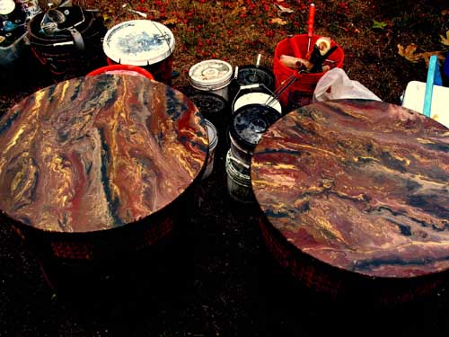 Modgepodge of concrete stain placed on the a round table.