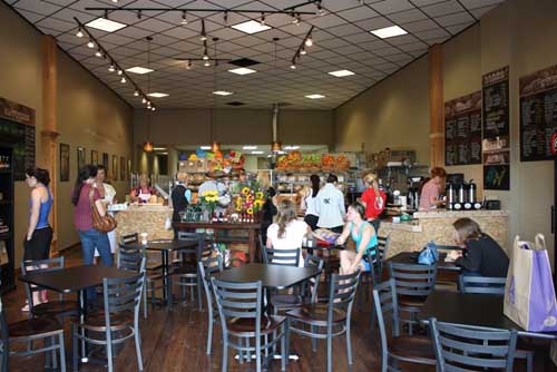 A look inside the Great Harvest Bread Co. restaurant that has decorative concrete throughout.