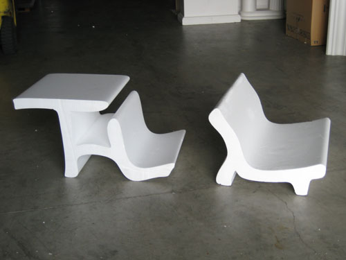 Cut forms out of foam before the chair is created with concrete.