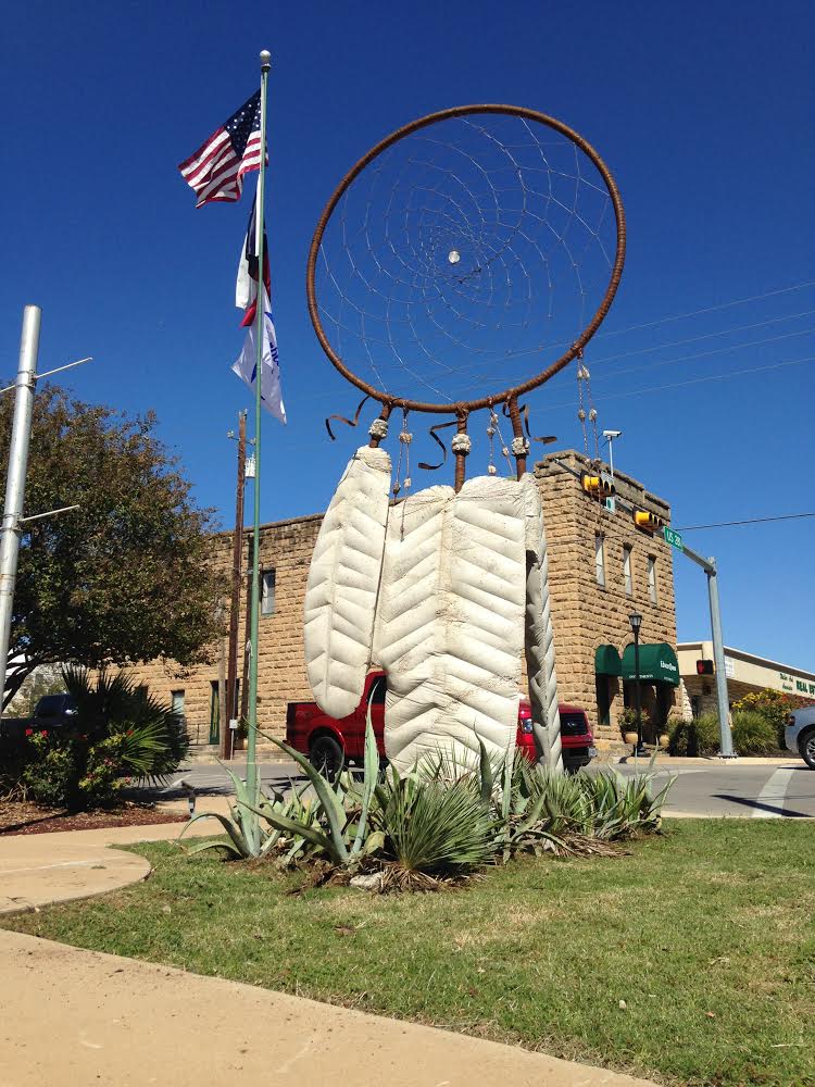 Update: WD tells us that Dreamcatcher won first place in the Marble Falls sculpture contest. Here's a photo of the finished Dreamcatcher in place, with landscaping.