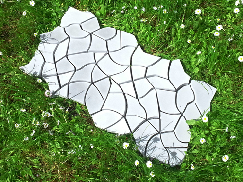 KAZA Concrete, a London, England, maker of handmade designer concrete tiles, sent Concrete Decor this news release about their latest signature project: custom tiles for a garden at a London flower show.