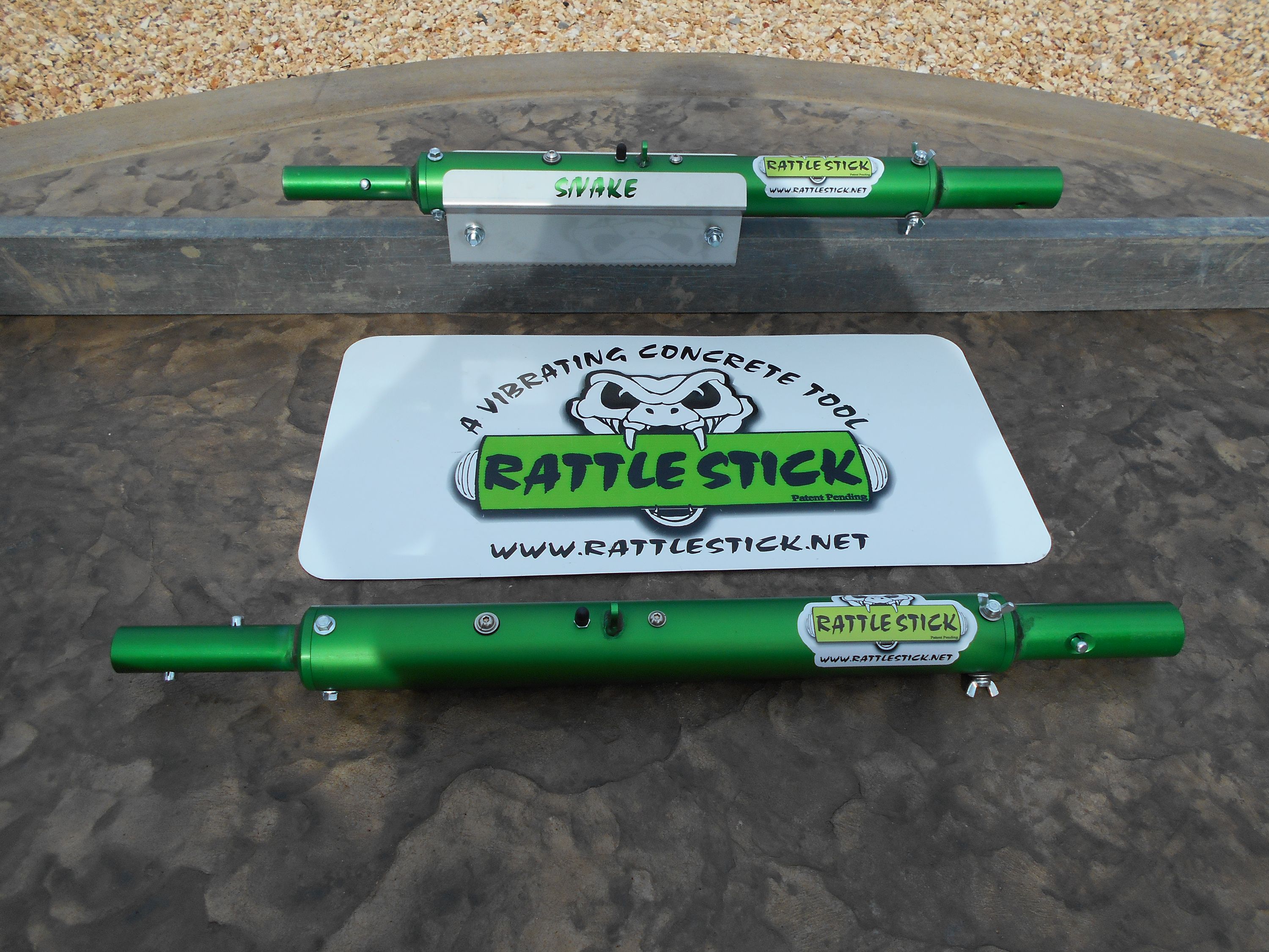 The Rattle Stick  a vibrating tool that attaches to walking tools such as bull floats, joint cutters and edgers  can also be more firmly affixed to aluminum screeds with the companys new Snake Bite screed bracket.